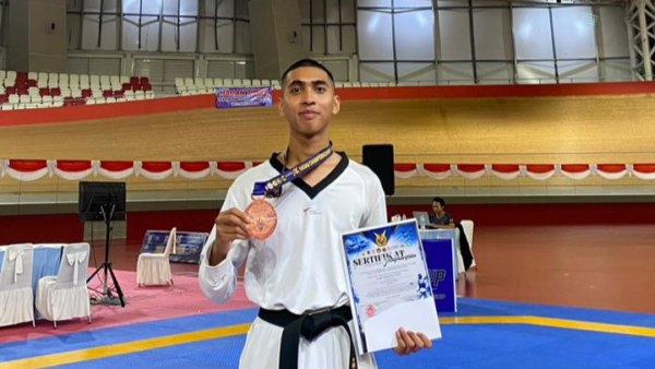 Bripda Alief Ardjuna Yusuf, atlet Batalyon C Pelopor Satuan Brimob Polda Metro Jaya, meraih medali perunggu nomor Kyorugi Prestasi Under 63 kilogram di Kasau Cup TNI/Polri Nasional 2026.